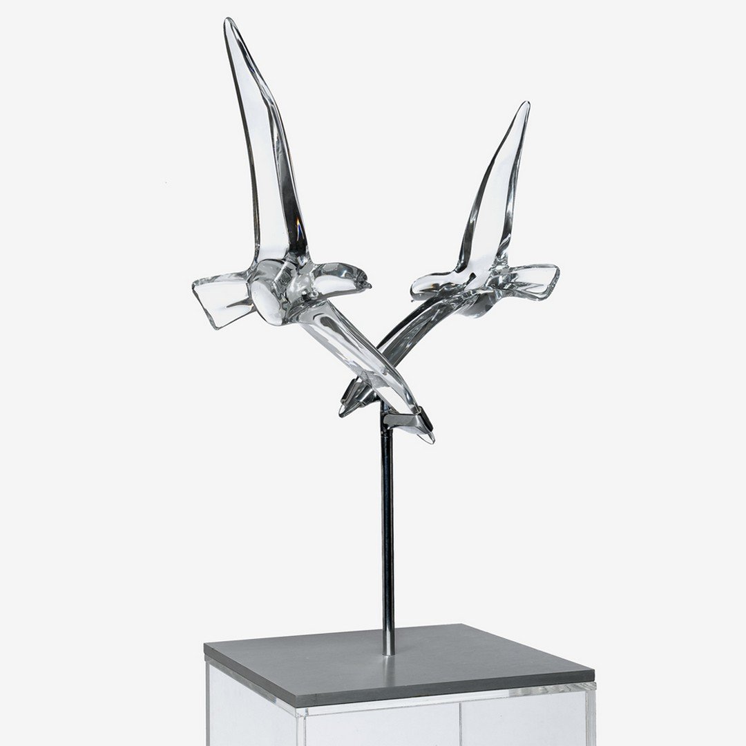 Contemporary Daum crystal sculpture, "Birds in Flight",: Contemporary Daum crystal sculpture, "Birds in Flight", 20th century. Displayed on chrome stand with rotating mounts, each bird engraved Daum France, with acrylic pedestal, one with repaired beak, H: 