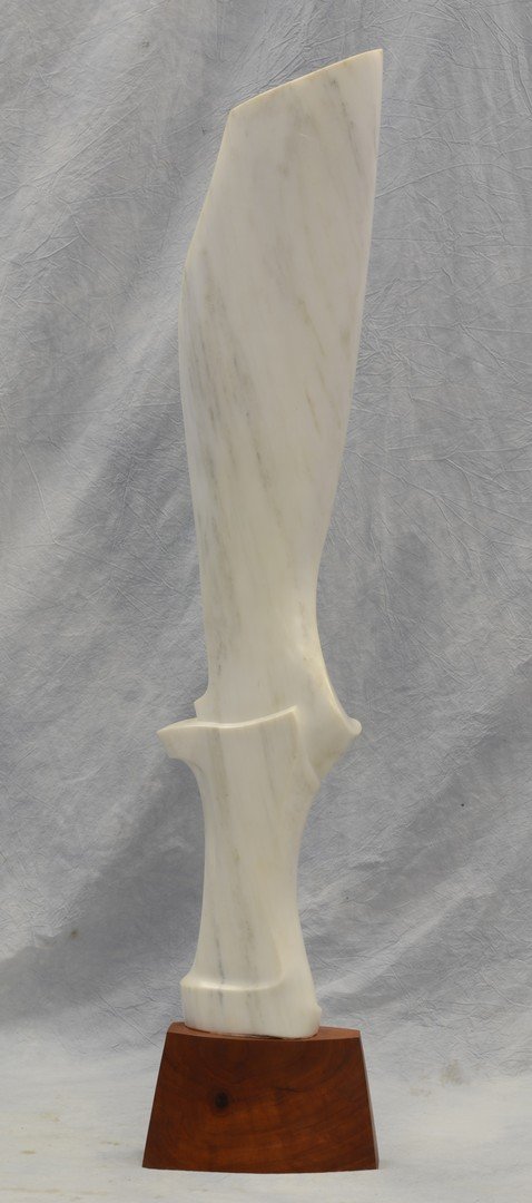 Jack Lewis, American, Louisiana, 20th c, carved white: Jack Lewis, American, Louisiana, 20th c, carved white marble mid-century design sculpture, tall figure, wood base may be cyprus, 41" high