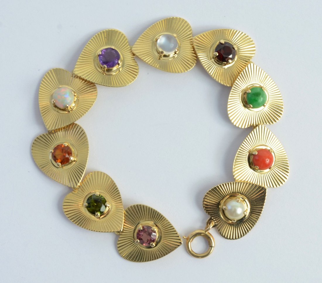14K YG heart link bracelet, each link set w/different: 14K YG heart link bracelet, each link set w/different stone including opal, pearl, coral, jade, garnet, amethyst, citrine, and others, 7" l, 15.7 dwt