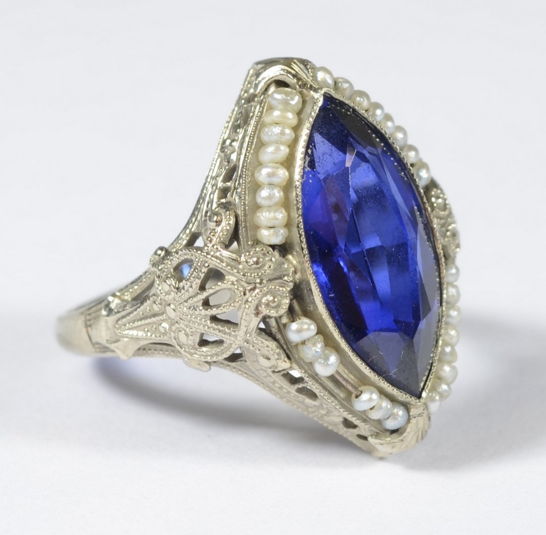 14K WG filigree ring w/marquis cut blue sapphire: 14K WG filigree ring w/marquis cut synthetic blue sapphire, 2.7 dwt, size 5 1/4