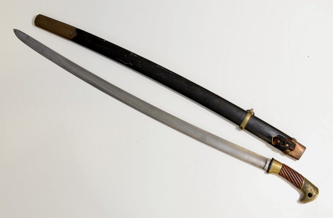 Soviet era Russian shashka, the 31 3/4" blade with: Soviet era Russian shashka, the 31 3/4" blade with Cyrillic marking on both sides at top, some pitting on top 5" of blade, clean below that, black lacquered wood scabbard with brass locket and chape, 
