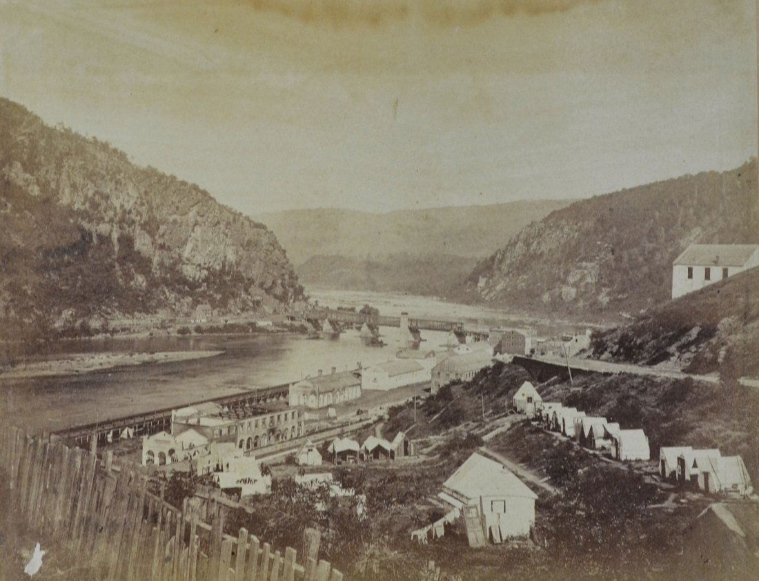 Gardner, Alexander, Meeting of the Shenandoah and: Gardner, Alexander, Meeting of the Shenandoah and Potomac at Harper's Ferry, Washington: 1866, No. 26, July 1865, 6 3/4" x 9" sight, on the original mount, water stain to top, small abrasion lower lef