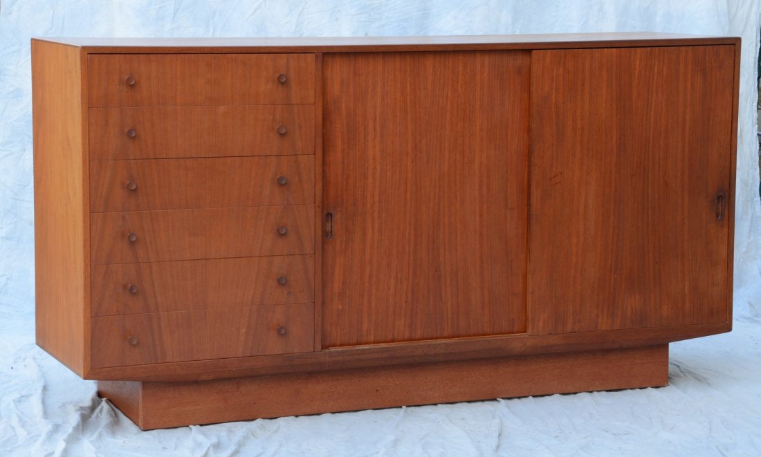 Hans Wegner for Carl Hansen teak credenza or sideboard,: Hans Wegner for Carl Hansen teak credenza or sideboard, 6 drawers at left end, 2 sliding doors concealing 6 drawers & open shelves, 66" w x 35" h x 17 1/2" d, labeled on back