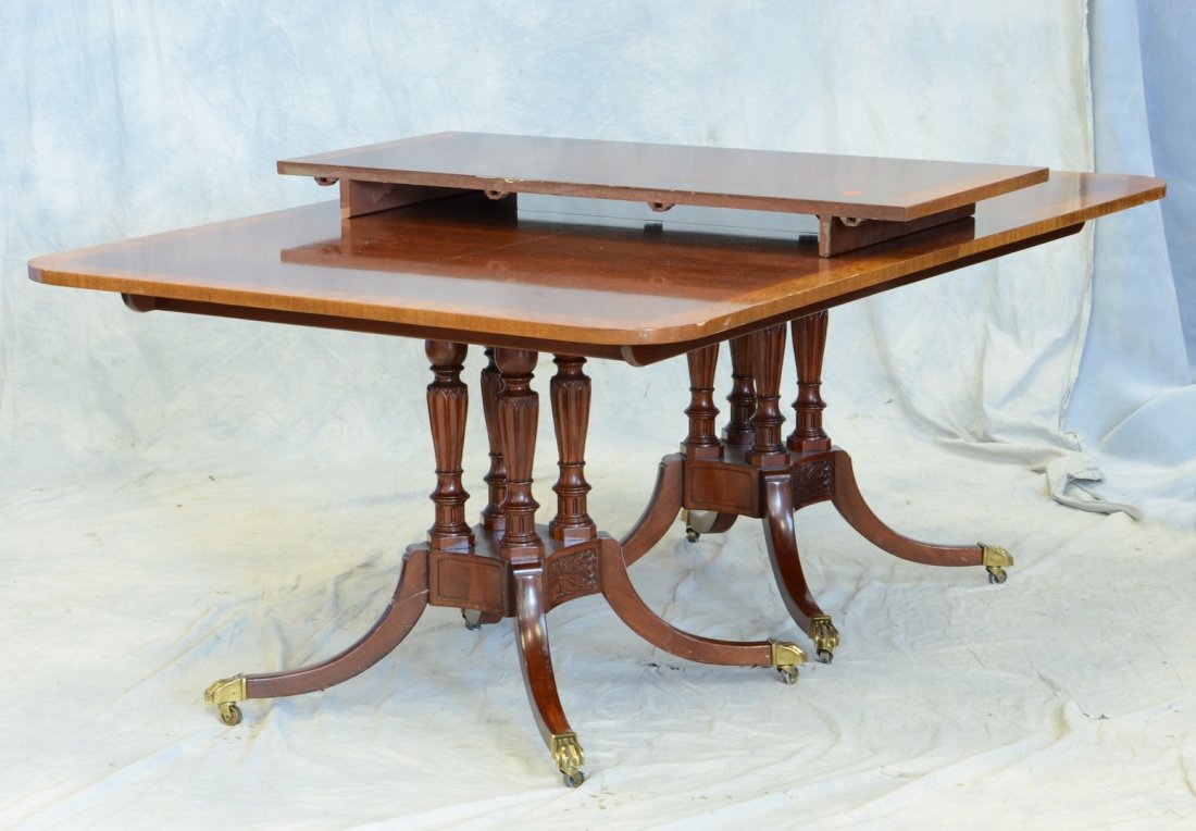 Baker banded mahogany double pedestal dining room: Baker banded mahogany double pedestal dining room table, each pedestal with 4 column cluster support, 46 1/2" w x 70" l x 20" w with leaf