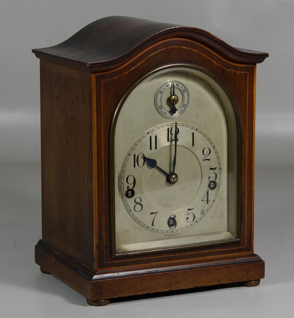 German arched top mantle clock, mahogany case, silvered: German arched top mantle clock, mahogany case, silvered dial, case with line inlay, 10-3/4" h x 7-3/4" w