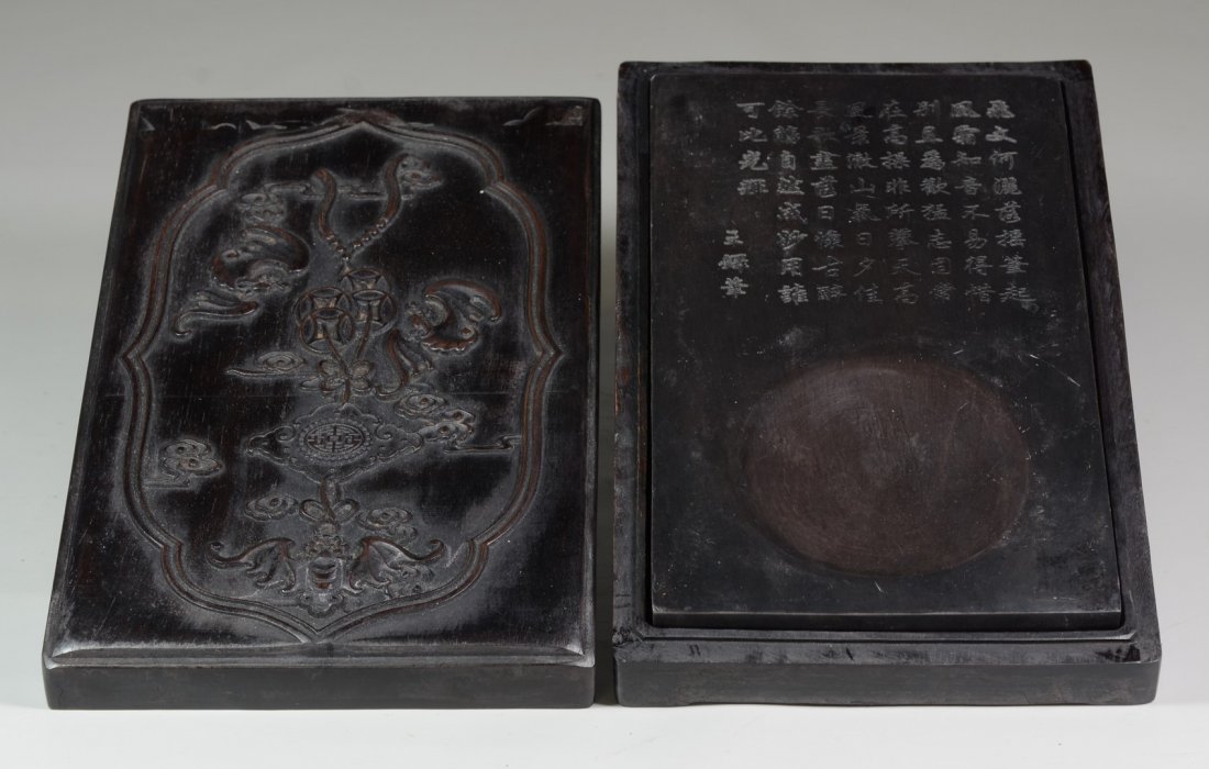 Chinese Carved Wood Box with Inkstone, box decorated: Chinese Carved Wood Box with Inkstone, box decorated with bats, coins, and clouds, inkstone with extensive calligraphy, box measures 10"h x 6 1/2"w x 1 3/4"d overall