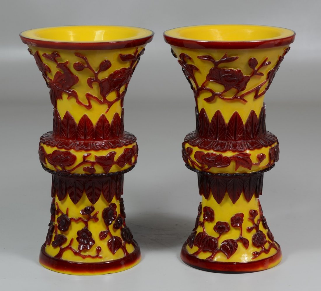 Pair of Chinese Carved Peking Glass Vases, depicting: Pair of Chinese Carved Peking Glass Vases, depicting birds and floral landscape, 9" high, large chip and old restoration to one rim