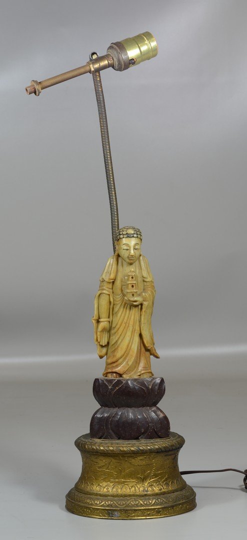 Chinese carved soapstone figure mounted as a lamp,: Chinese carved soapstone figure mounted as a lamp, figure measures 10" high, lamp needs rewiring, overall 22" high