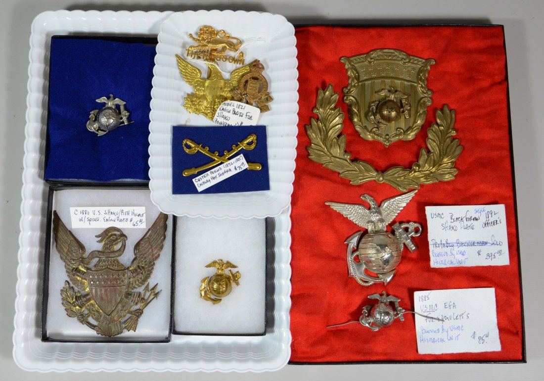 10 Military Pieces, to include: pith helmet eagle plate: 10 Military Pieces, to include: pith helmet eagle plate, circa 1880, USMC epaulet pin, circa 1885, USMC WWII pin, Custer-period calvary hat insignia, USMC shako plate, 1868, and 5 other pieces