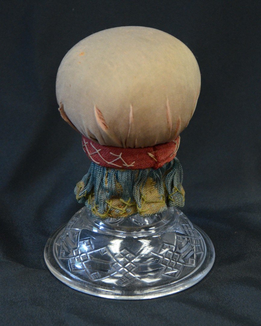 Make-do pin cushion, clear glass base, old fabric top, (1 of 1)