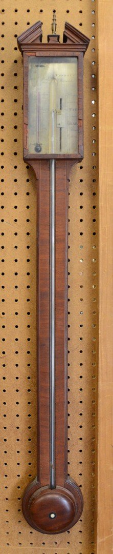 Mahogany stick barometer signed Pozzi & Co: Mahogany stick barometer signed Pozzi & Co, English, with straight pediment top and thermometer tube, some veneer losses around top of glass, 38" high