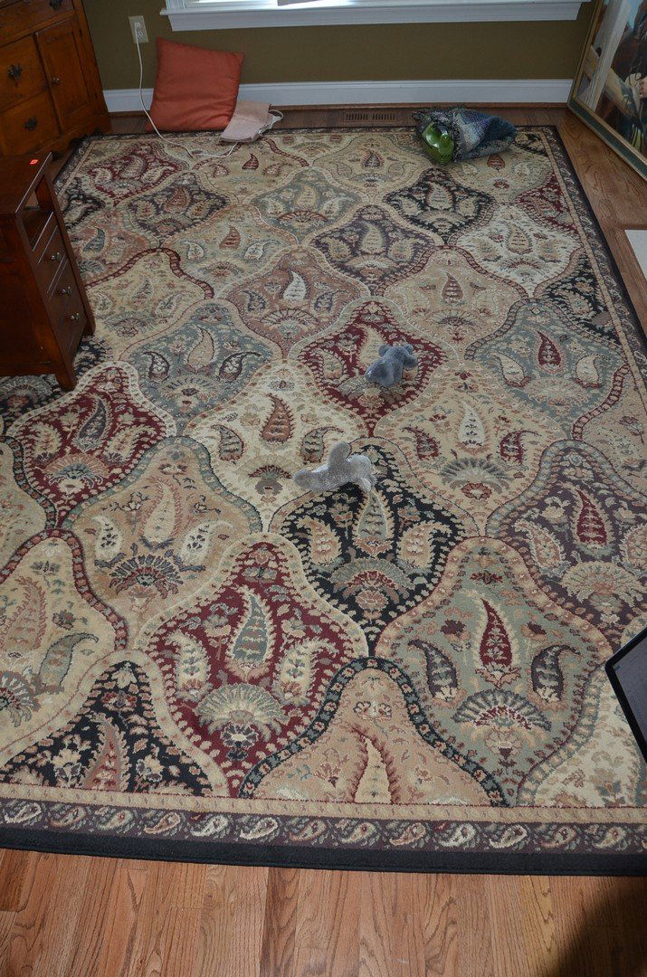 7'8" x 11' machine made oriental style carpet (1 of 2)