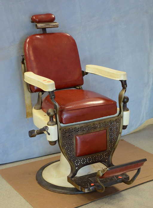 Theo A Kochs white enameled hydraulic barber chair,