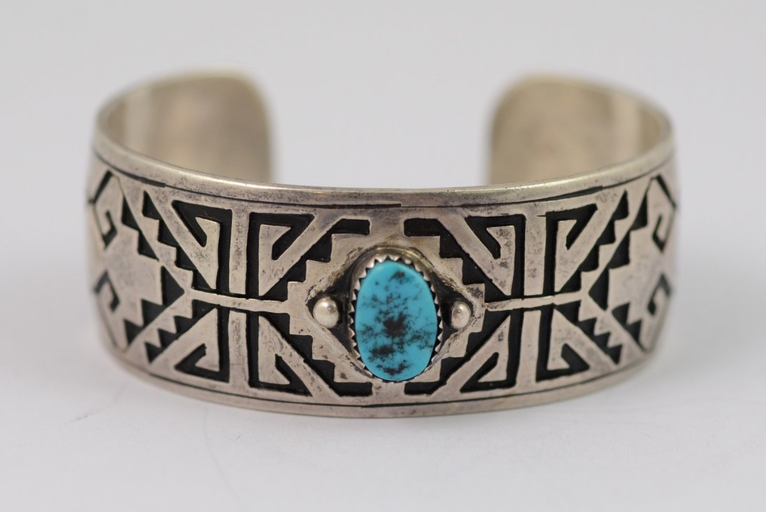 Kenneth Kuwanvayouma, Hopi sterling cuff bracelet, (1 of 3)