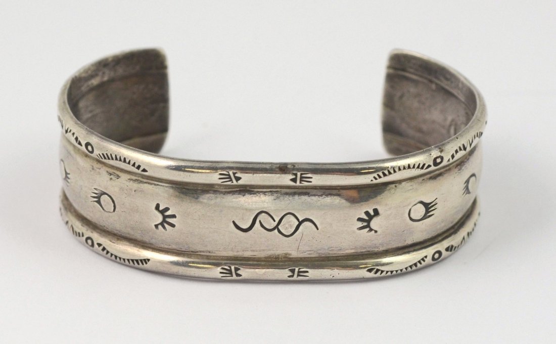 Bessie Castillo, Navajo stampwork cuff bracelet, bear (1 of 3)