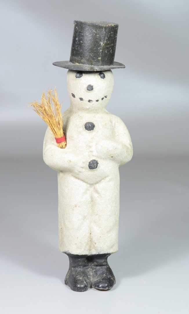 Composition snowman with paper hat and bundle of twigs, (1 of 1)