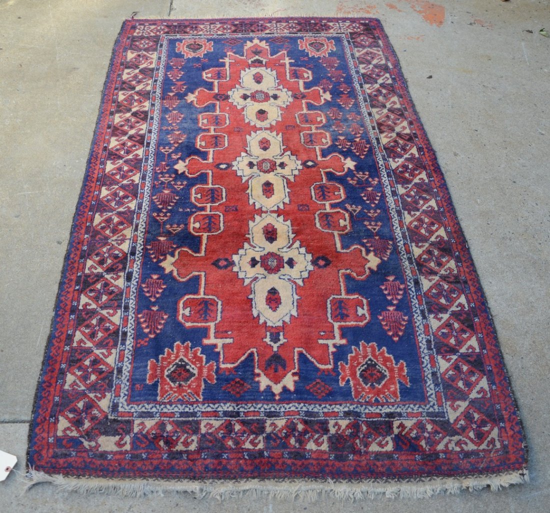 Caucasian style rug with five-banded border, red and (1 of 2)