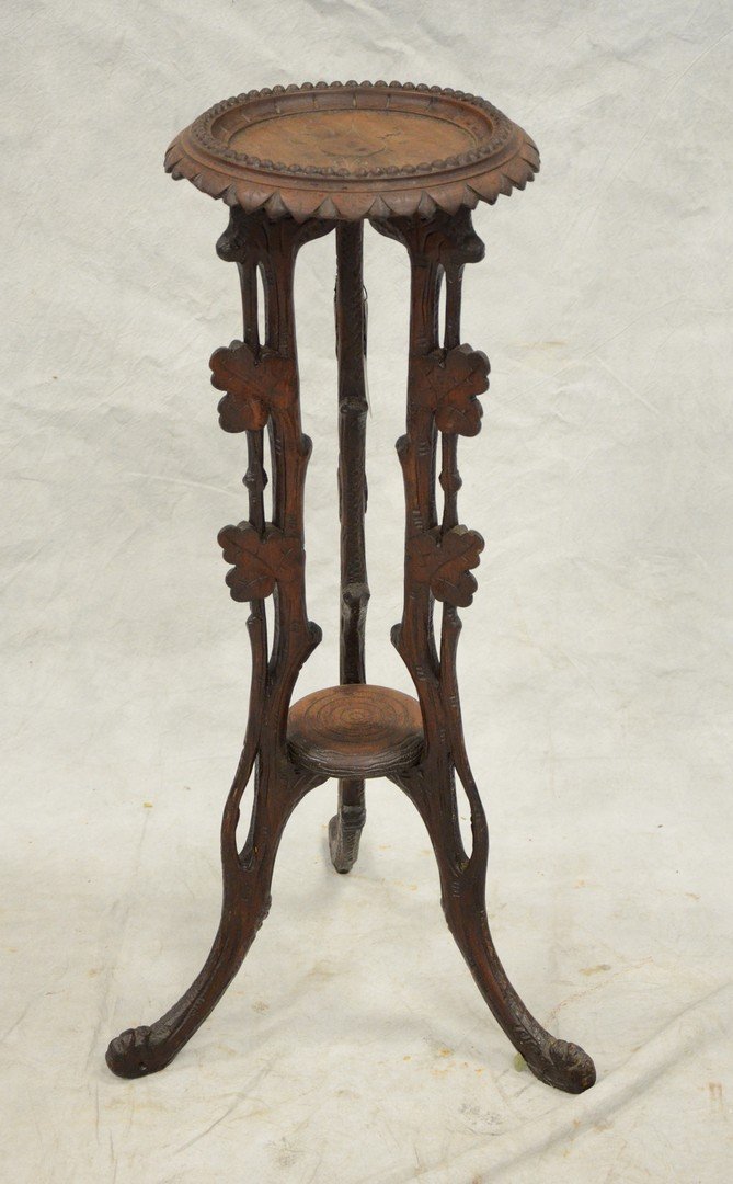 Walnut Victorian pedestal, 12" d relief carved top, 33" (1 of 1)