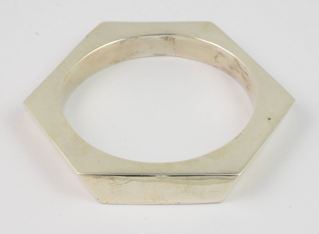 Taxco sterling silver mid-century bangle, marked AP, (1 of 2)