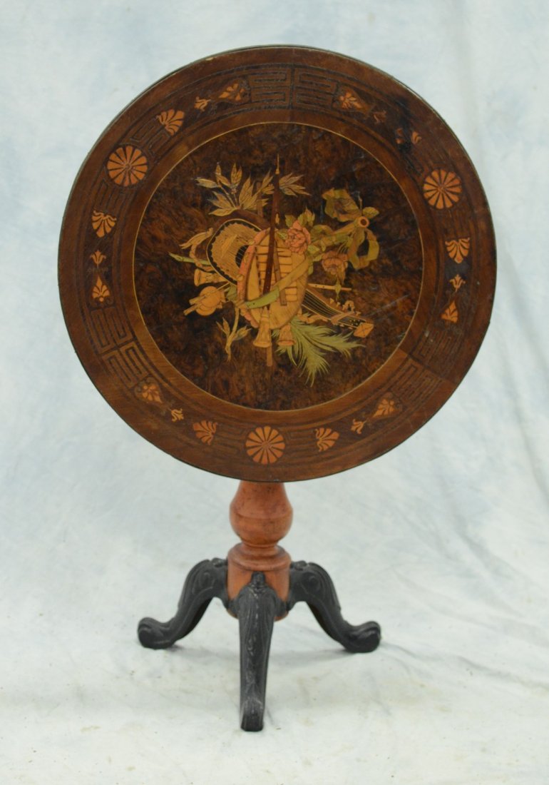 Round marquetry inlaid tilt top table, the top with (1 of 4)