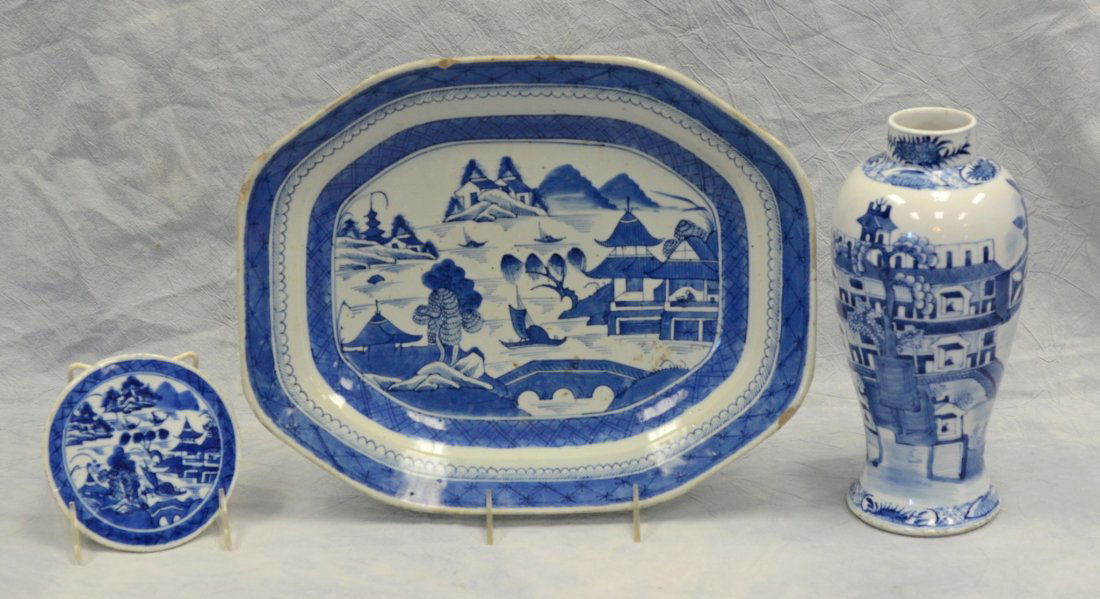 (3) Pieces of Chinese blue and white porcelain to: (3) Pieces of Chinese blue and white porcelain to include a Canton platter, 14-1/8" diameter, chips to rim; together with a circular Canton trivet, 4-3/4" diameter; and Chinese blue and white porcelai