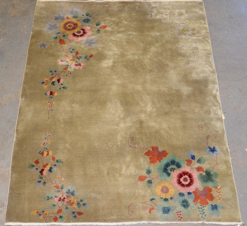 8'9" x 11'5" Nichols Chinese rug: 8'9" x 11'5" Nichols Chinese rug, pale green with floral sprays in corners, some wear