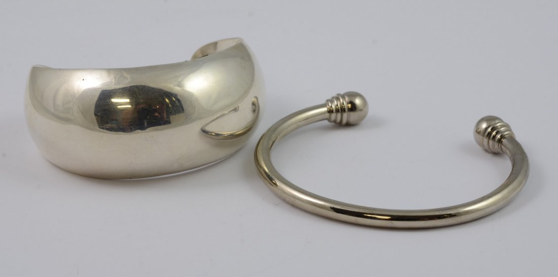 (2) Open Cuff Bracelets, including Taxco Mexican silver: (2) Open Cuff Bracelets, including Taxco Mexican silver cuff, 2-1/2" diameter, together with unmarked silver bracelet, total weight 2.27 TO