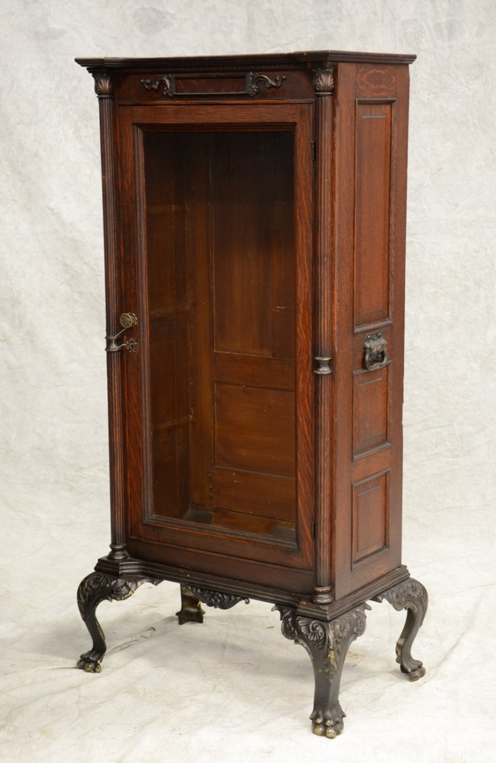 Oak cabinet for a Mills "Dewey" model slot machine, (1 of 3)