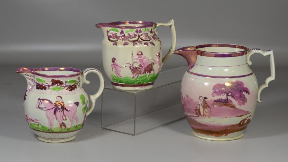 Three English pink luster pitchers, one decorated with (1 of 3)