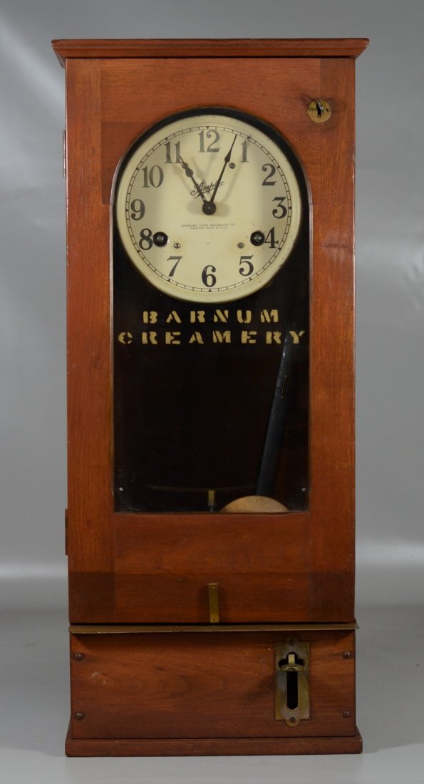 Simplex time recorder clock, walnut finished case,: Simplex time recorder clock, walnut finished case, "Barnum Creamery" stenciled on door, with original label on inside