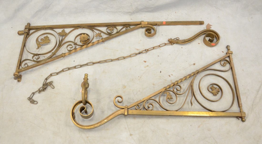 Brass wall brackets, originally held glass globes, one: Brass wall brackets, originally held glass globes, one needs to reattached as pictured, max depth 40", approx 20-1/2" h