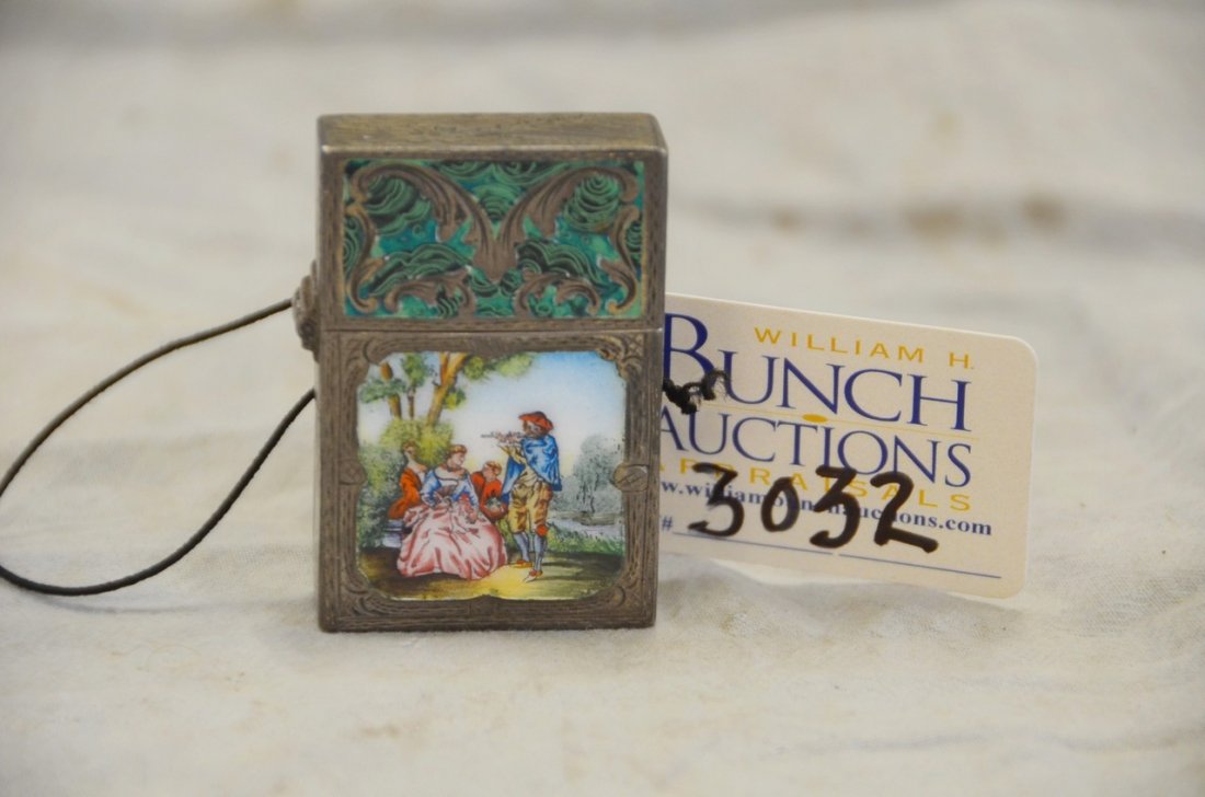 Engraved and enameled 800 silver cigarette lighter, (1 of 2)