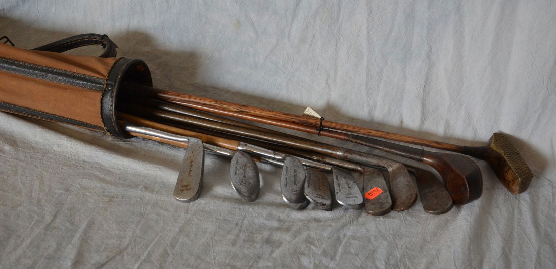 Early canvas golf bag with 10 early clubs including: (1 of 6)