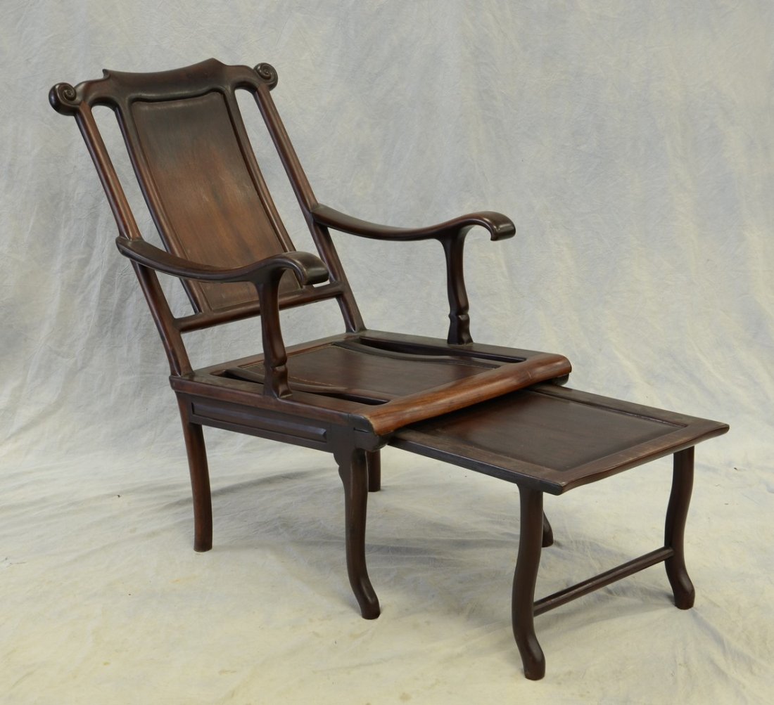 Carved teak Chinese lounge chair with pull out foot (1 of 3)