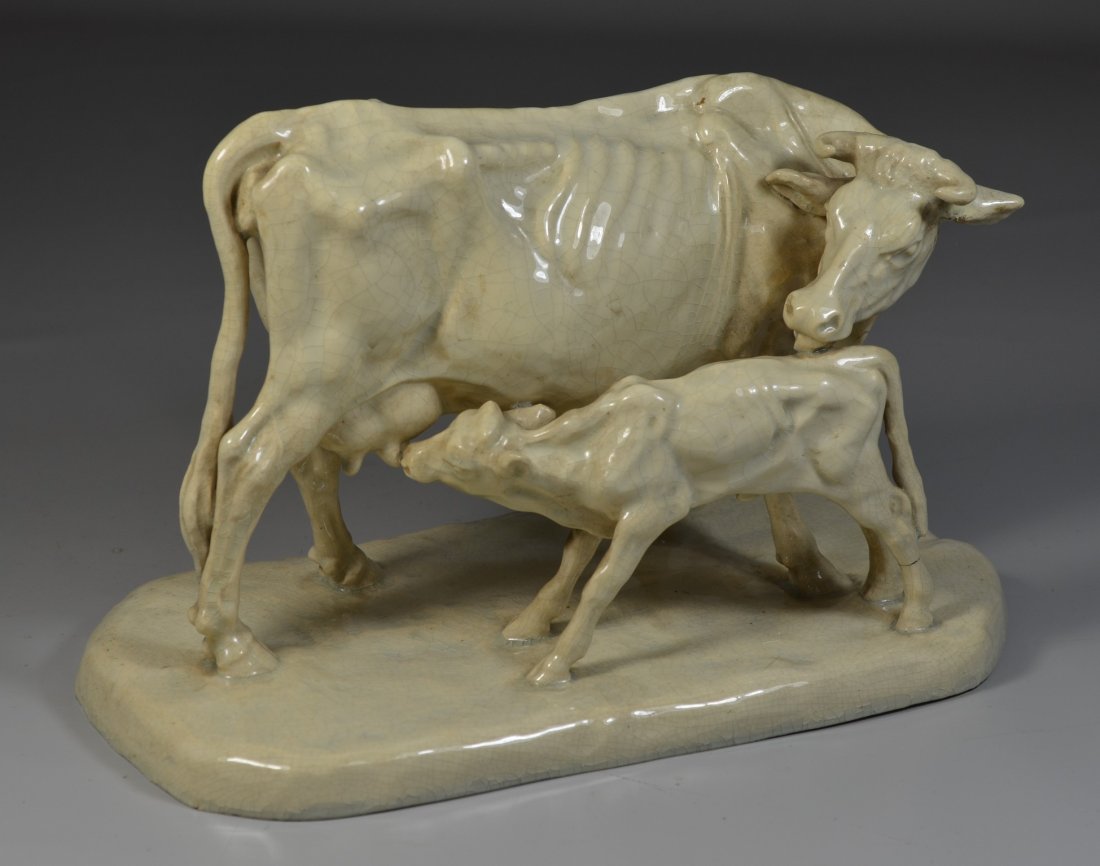 Dutch glazed pottery cow and calf, signed and marked on (1 of 4)