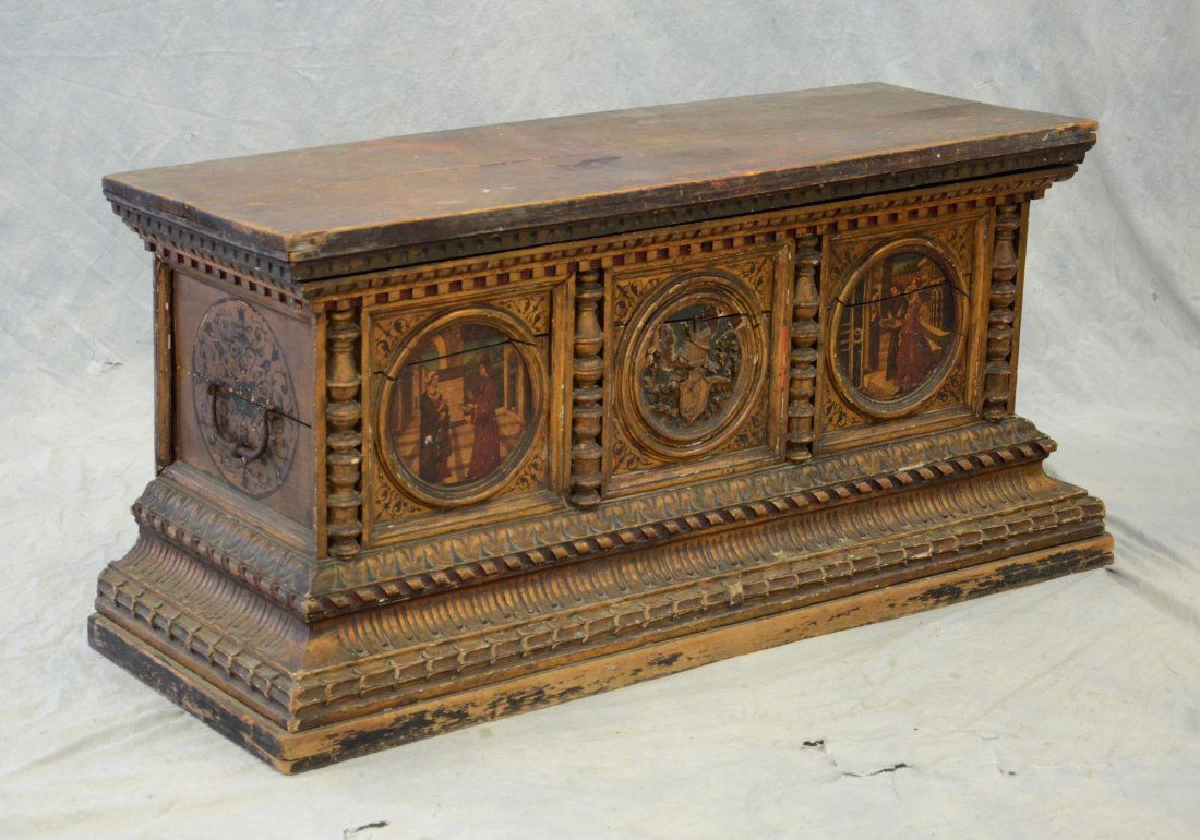 Italian painted & gilt cassone, central panel with coat: Italian painted & gilt cassone, central panel with coat of arms, each side panel with medieval painted scene, loss to finish of base, each panel cracked, 53" w x 24" h x 18-1/2" d, Ex: Collection of I