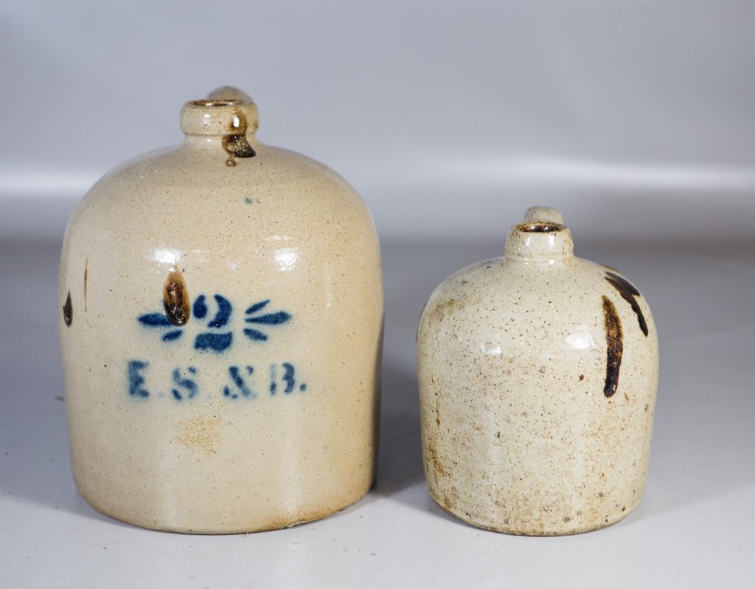 (2) stoneware jugs, larger one with stenciled "2 / ES & (1 of 4)