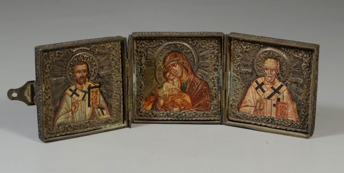 Greek silvered metal and painted tryptich icon, Madonna: Greek silvered metal and painted tryptich icon, Madonna & Child, and 2 apostles, opened 8" w x 3" h, likely painted on wood, allover craquelure to the icons