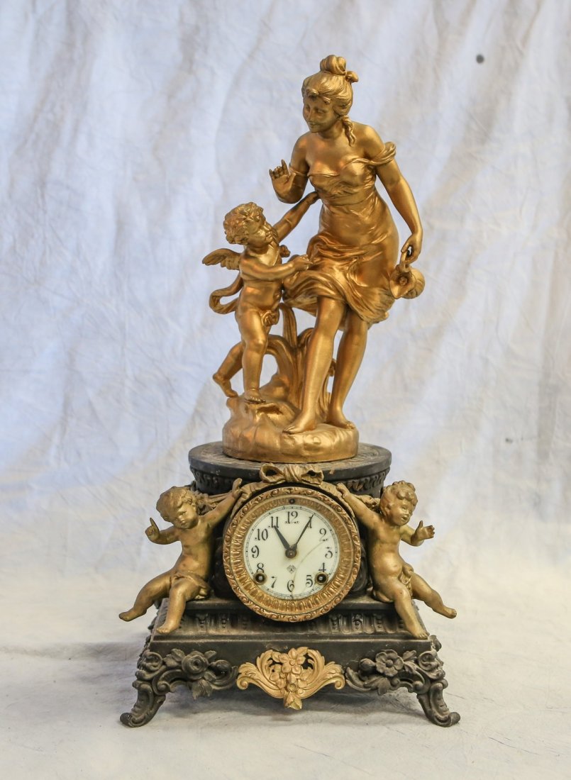 Ansonia white metal figural mantle clock, top figure (1 of 5)