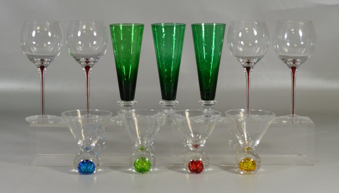 (11) Clear & colored bar glasses, c/o (4) wine with red: (11) Clear & colored bar glasses, c/o (4) wine with red stems 9" h, (3) green controlled bubble pilsner glasses 8-3/4" h, (4) martini glasses with controlled bubble bases5-1/4" h