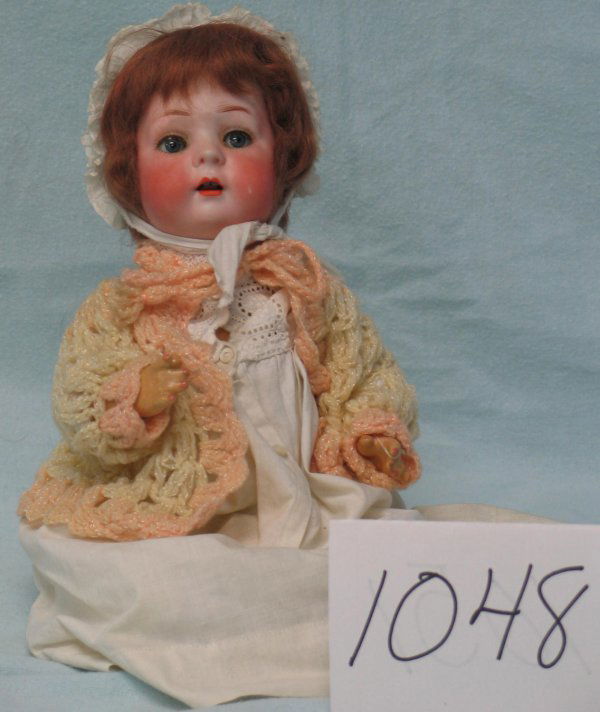 German character baby doll, by Bruno Schmid: German character baby doll, by Bruno Schmidt, blue glass sleep eyes, multistroke auburn eyebrows, open mouth with 2 upper teeth, cheek rub, newer auburn mohair wig, head marked Made in Germany BSW (in