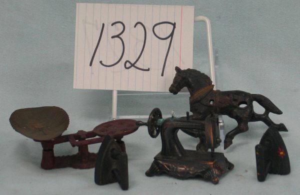 Lot of cast metal miniatures.: Lot of cast metal miniatures. Including: 2 flat irons; kitchen scale; sewing machine pencil sharpener; cast metal horse (probably from a carousel).