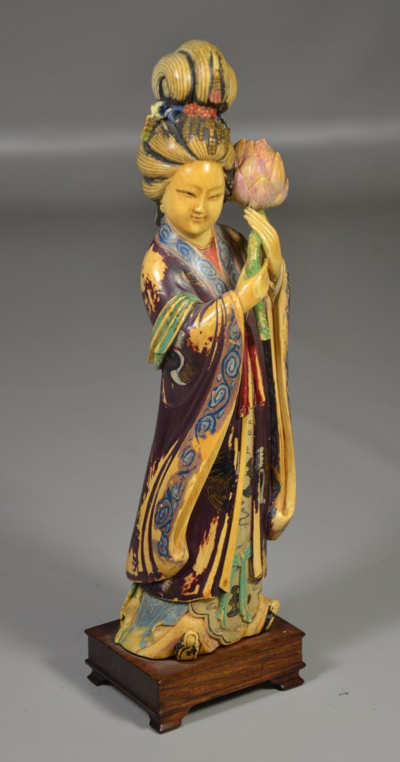 Polychrome figure of young maiden holding lotus (1 of 3)