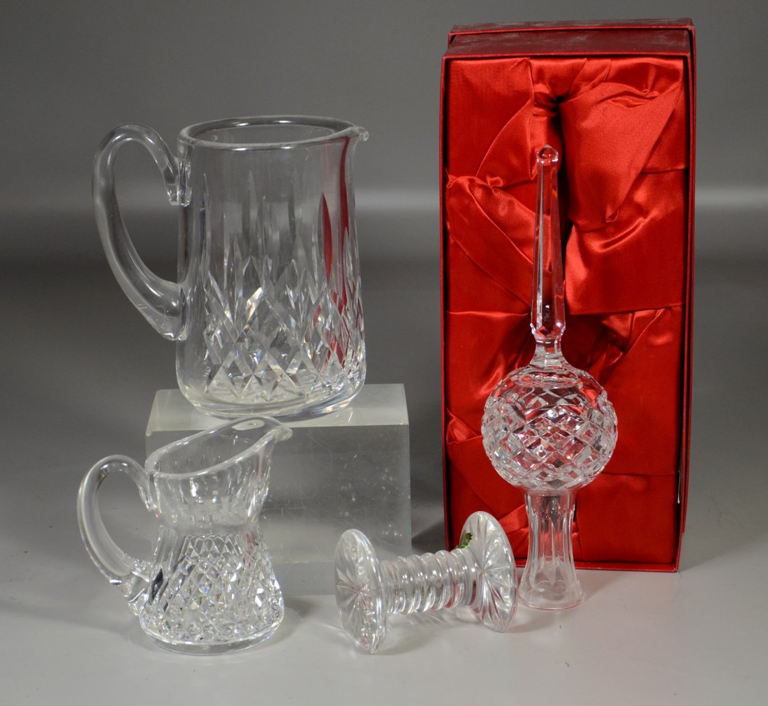 (4) Pieces Waterford crystal, including Christmas tree: (4) Pieces Waterford crystal, including Christmas tree topper in original box, pitcher, creamer, knife rest, largest 10"