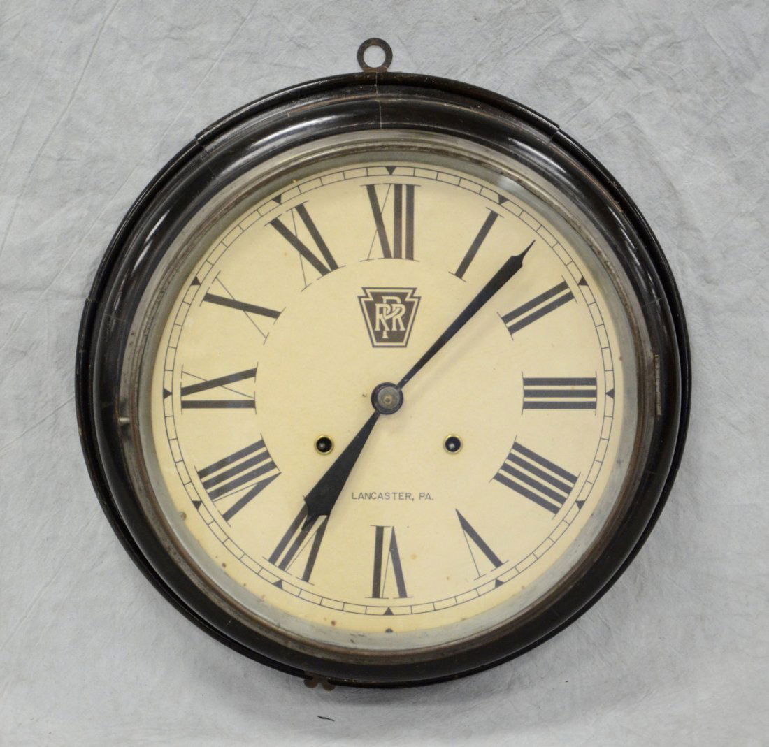 Black lacquer gallery clock, paper dial "PRR, (1 of 3)
