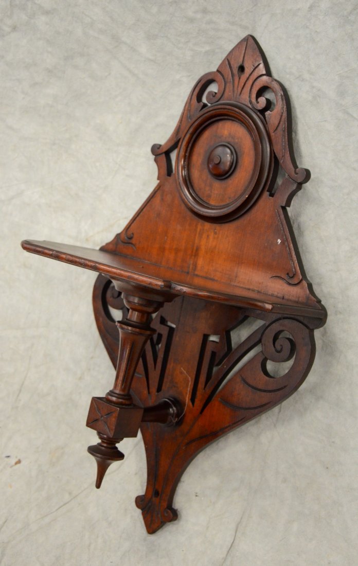 Carved walnut Victorian wall shelf, 27 1/2" h, 16" w, (1 of 4)