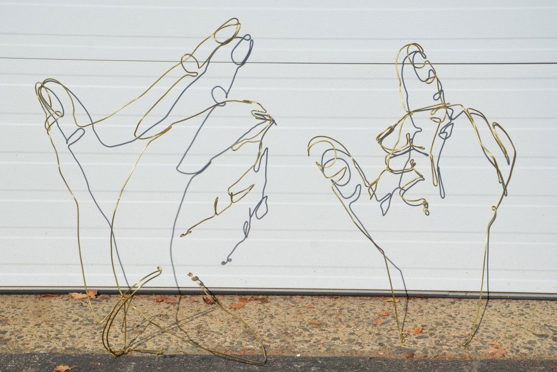 Contemporary brass wire sculpture of hands, unknown (1 of 4)