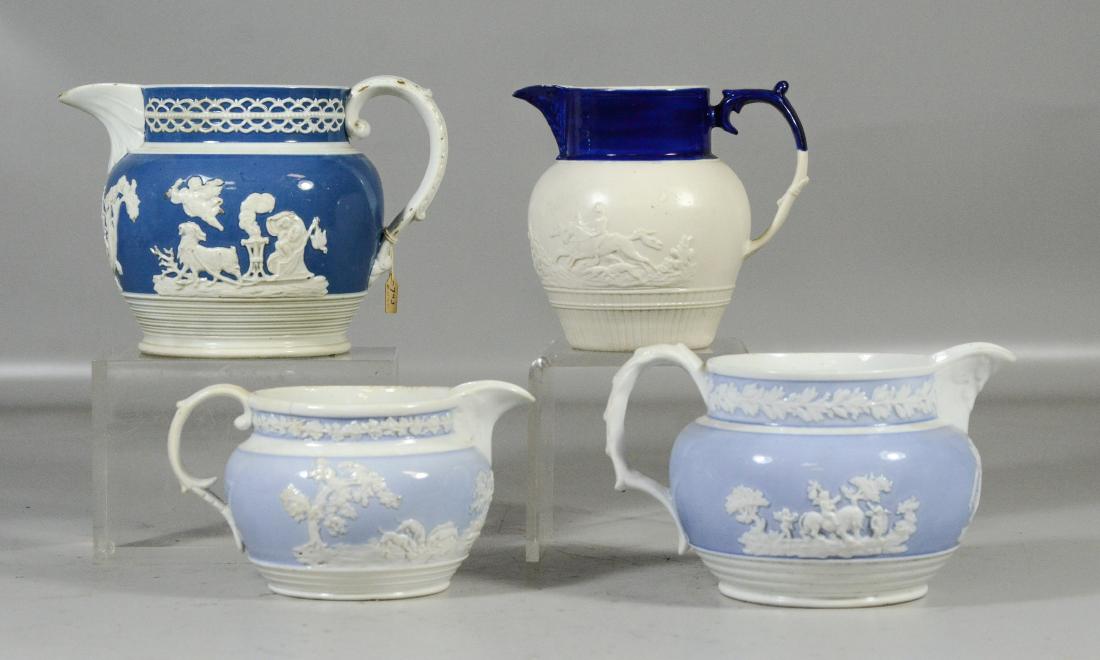 4 English pottery pitchers with farm & hunt scenes,: 4 English pottery pitchers with farm & hunt scenes, hairline to one, tallest 5-1/2"