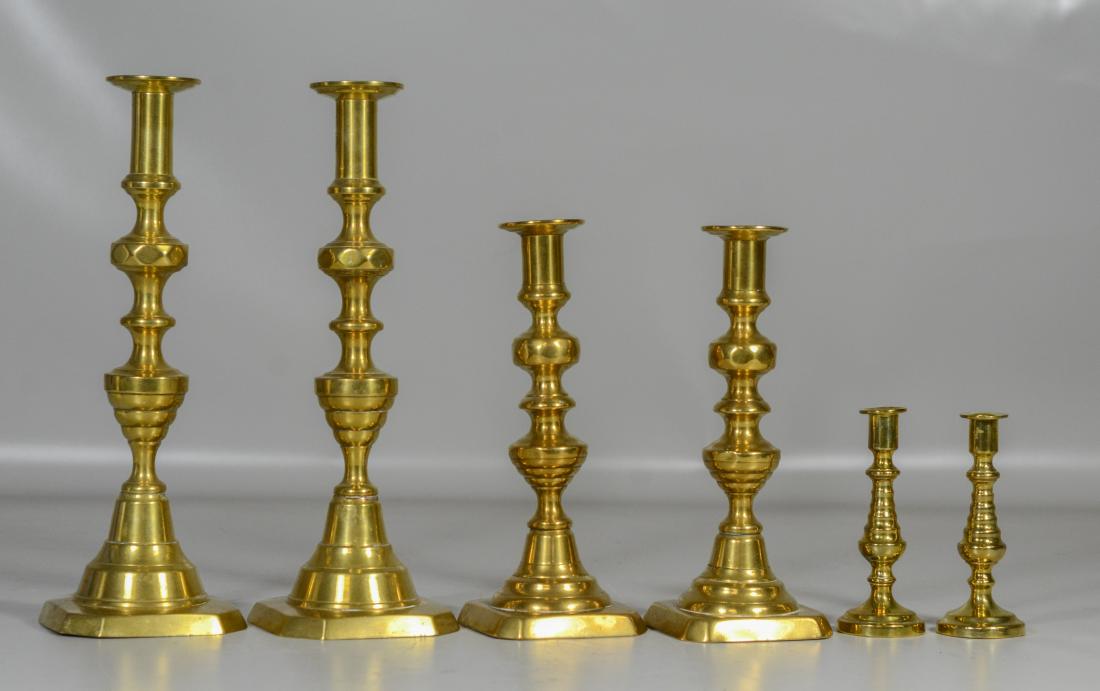 3 Pairs of English brass candlesticks, 2 pairs with (1 of 2)