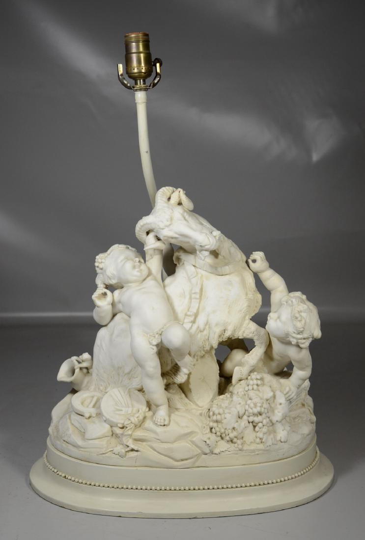 Parian porcelain of cherubs cavorting with a goat,: Parian porcelain of cherubs cavorting with a goat, losses and restorations, 16 1/2" to top of figurine, unsigned, probably 19th c